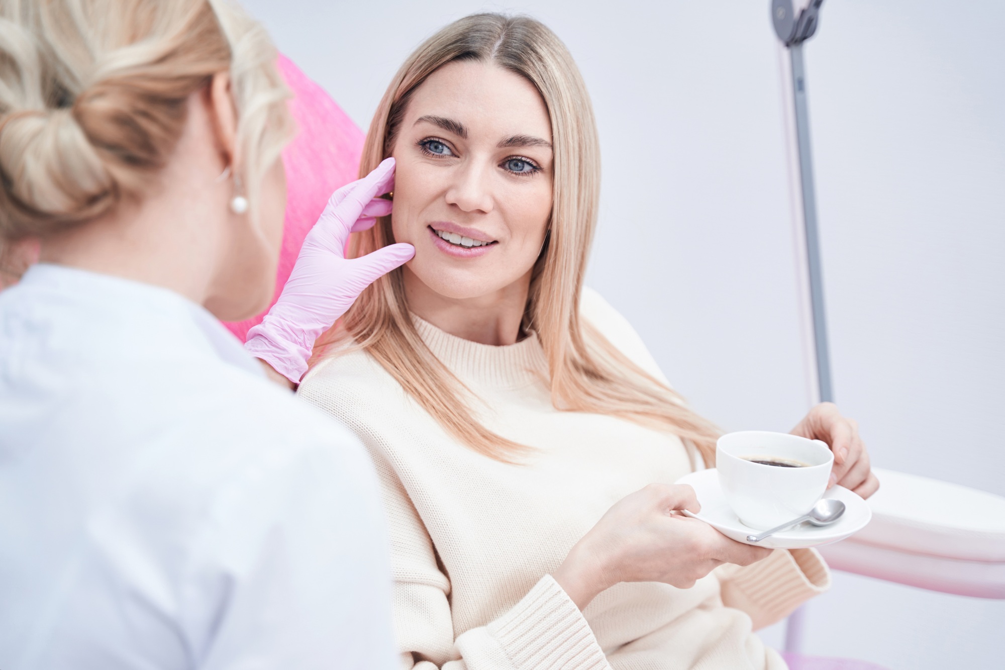 Aesthetic clinic client having consultation with dermatologist